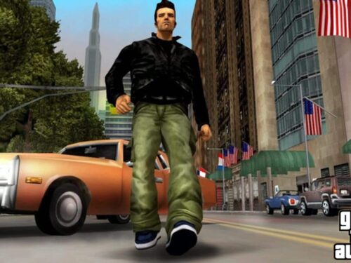 Cena de GTA III mostrando Claude caminhando pelas ruas de Liberty City, com carros e prédios